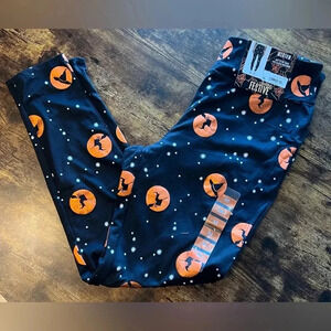 Feeling Festive | ladies jet black witch hats Halloween leggings. Size: M